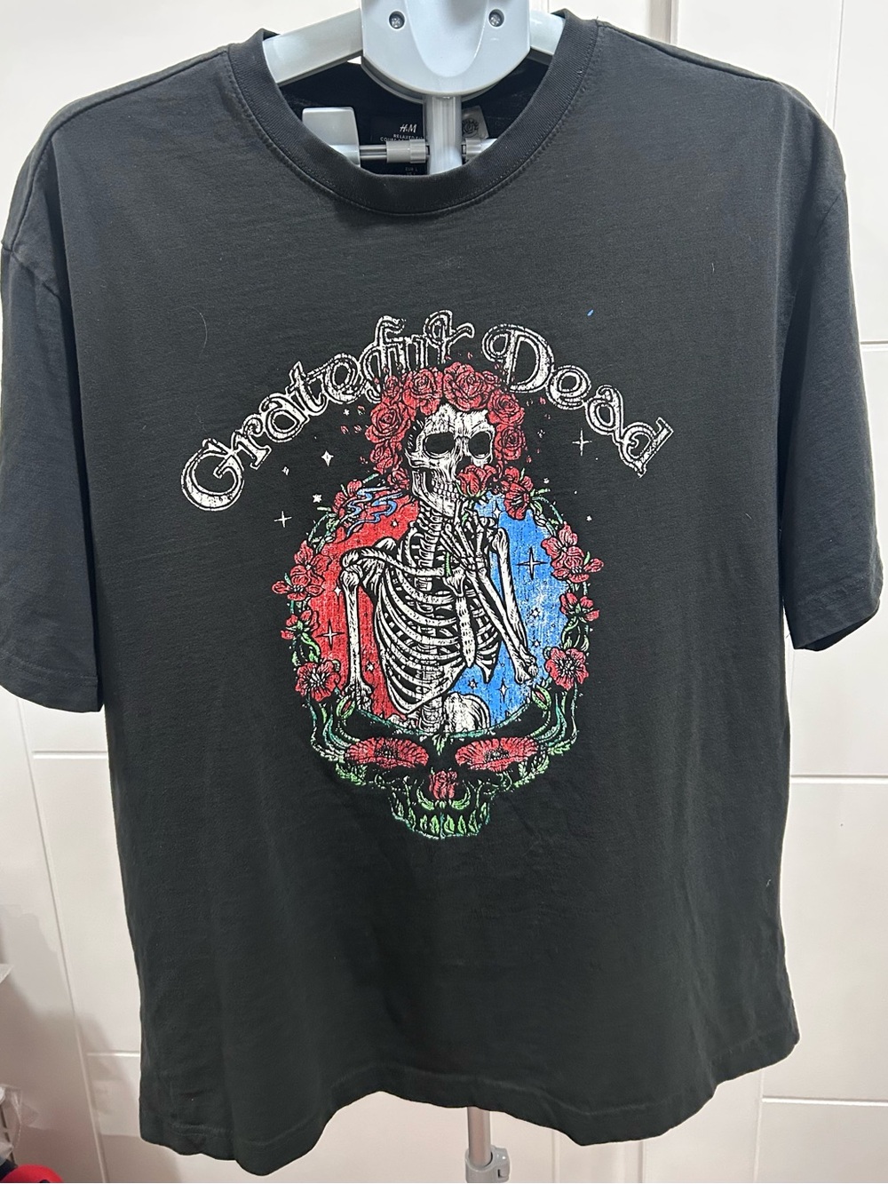 H&M Black Grateful Dead Tee with Red and Blue Skeleton Graphic, Size L.